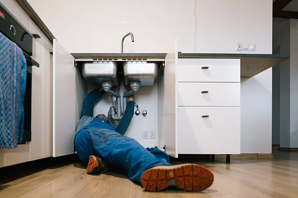 Professional Emergency Plumber technician working in Westhampton Beach, NY
